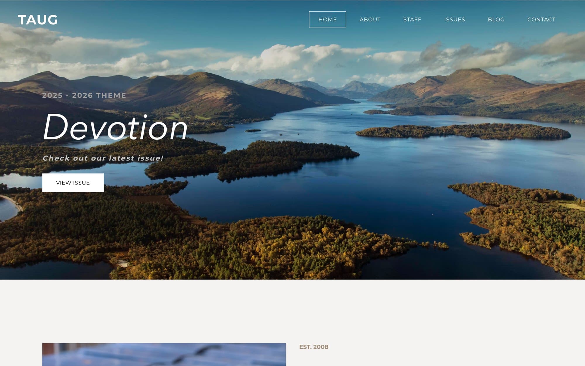 TAUG home page — full-bleed landscape hero announcing the 2025–2026 theme, Devotion, with a View Issue button